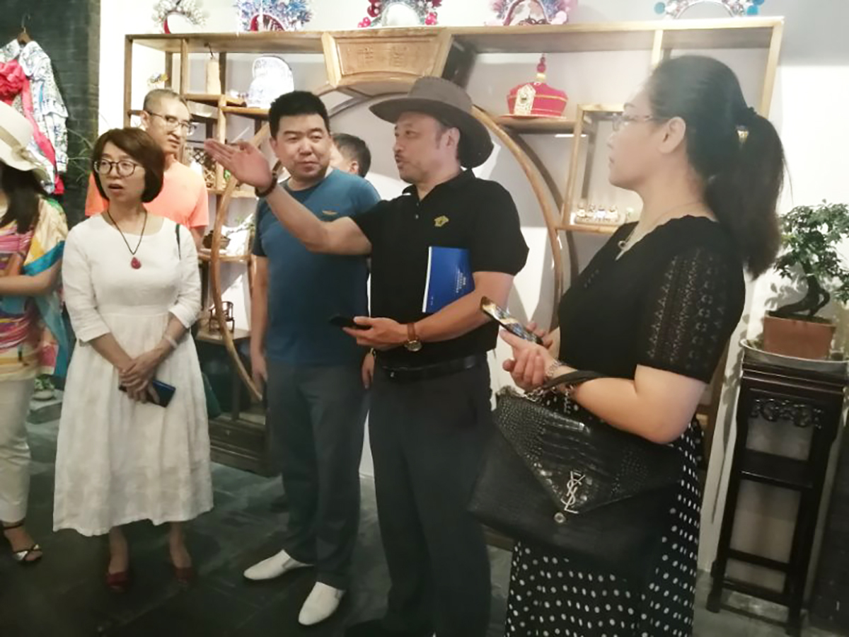 泸州市文化遗产保护协会易国璋会长一行到川味中国调研(图1)